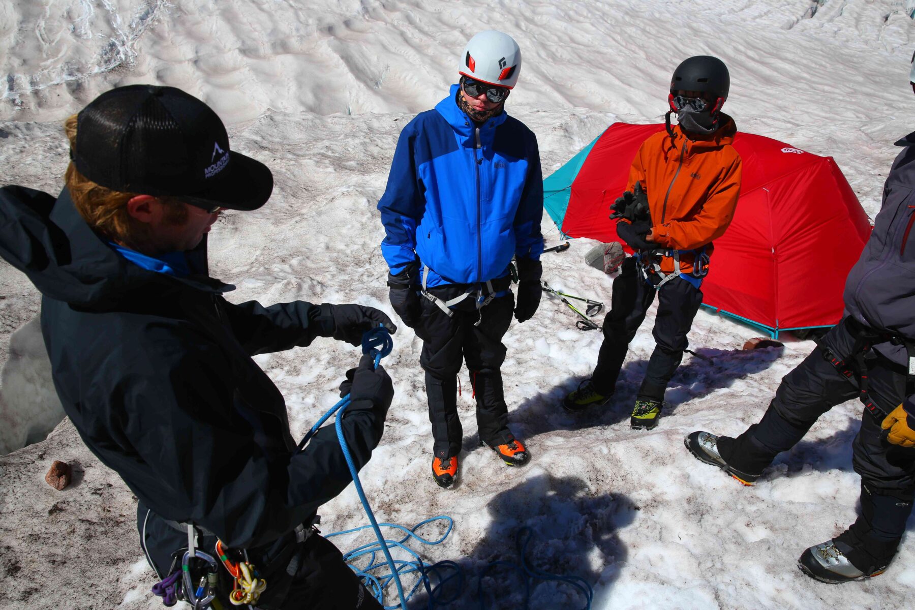 In a mountaineering safety training.a student slides down a steep glacier  slope trying to arrest himself while the teacher,a mountain guide,is giving  advice,Moiry Glacier,Valais,Switzerland Stock Photo - Alamy